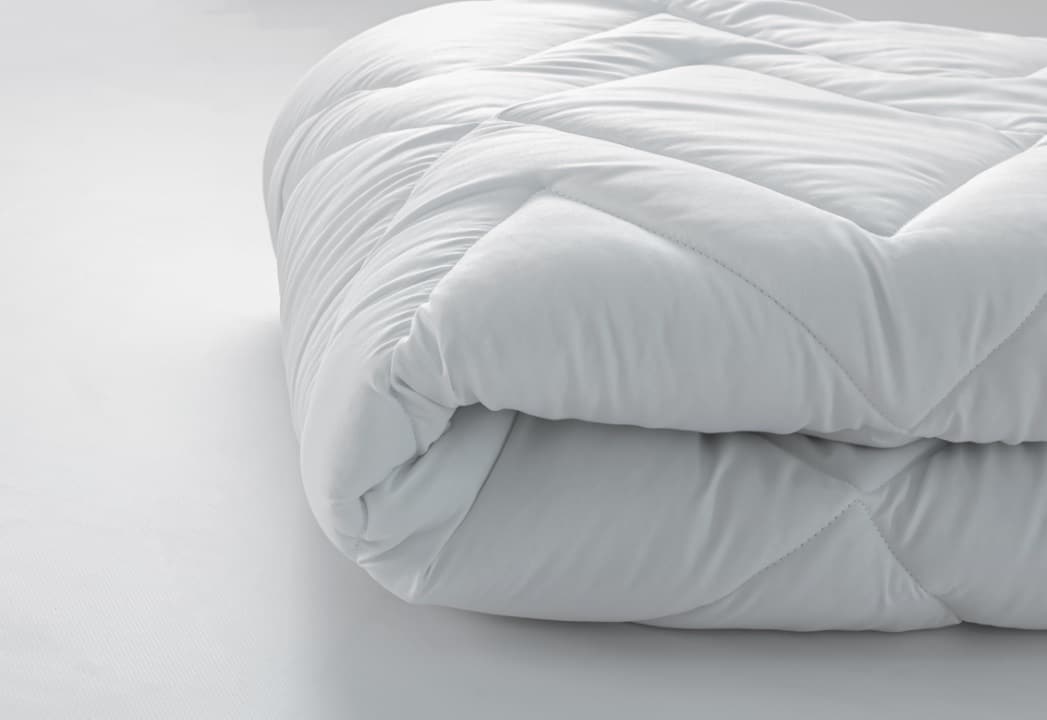 couette chaude ploée en deux
